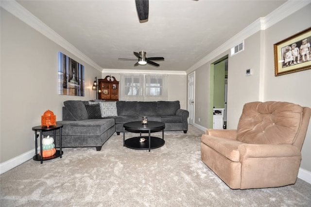 carpeted living room with ceiling fan and crown molding