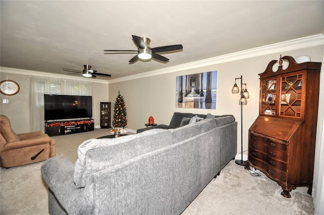 carpeted living room featuring ceiling fan and crown molding