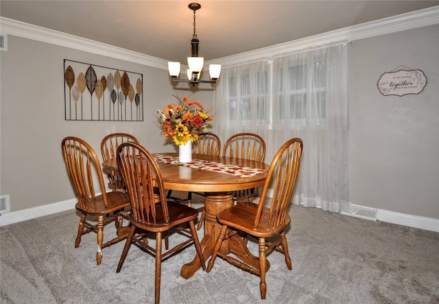 carpeted dining space with ornamental molding and an inviting chandelier