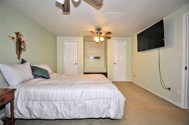 bedroom with light colored carpet and ceiling fan