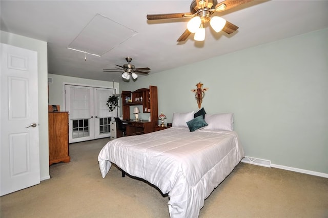 bedroom with carpet, french doors, and ceiling fan