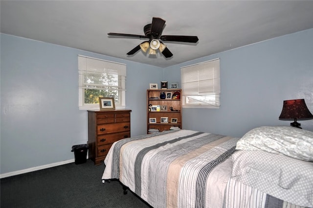 carpeted bedroom featuring ceiling fan