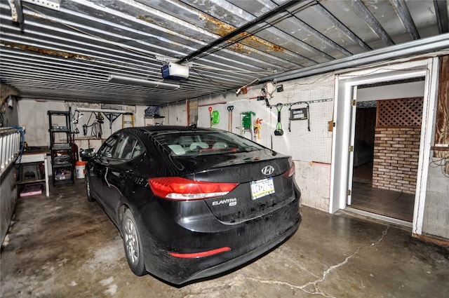 garage featuring a garage door opener