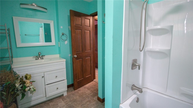 bathroom featuring vanity and tub / shower combination