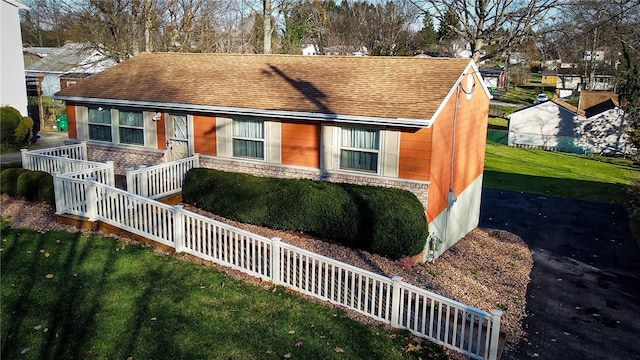 view of front of home with a front yard