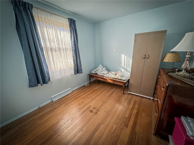 bedroom featuring hardwood / wood-style flooring