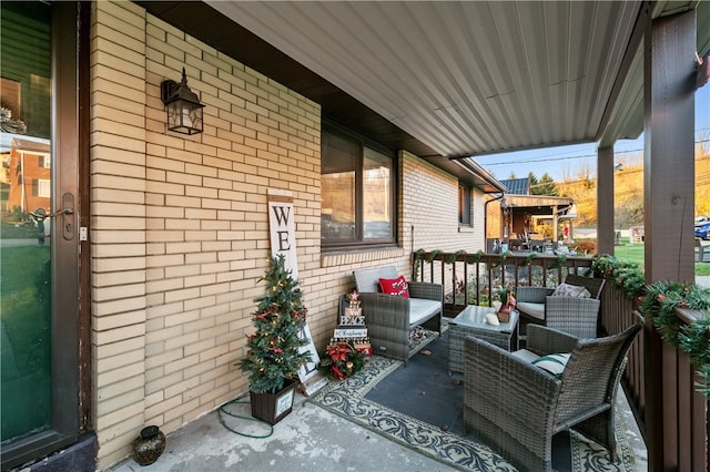 balcony featuring covered porch