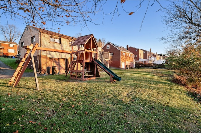 view of play area featuring a lawn