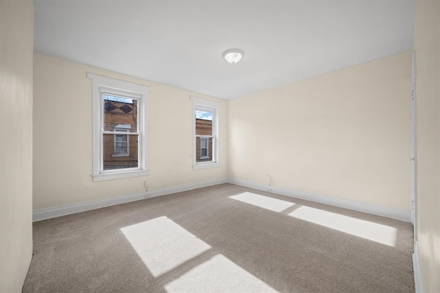 view of carpeted spare room