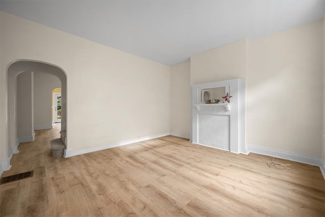 unfurnished room featuring light wood-type flooring