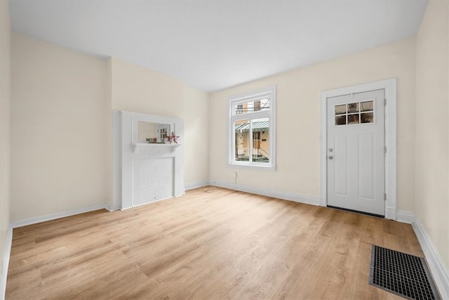 entrance foyer featuring light hardwood / wood-style floors