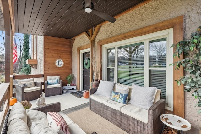 view of patio featuring ceiling fan and an outdoor living space