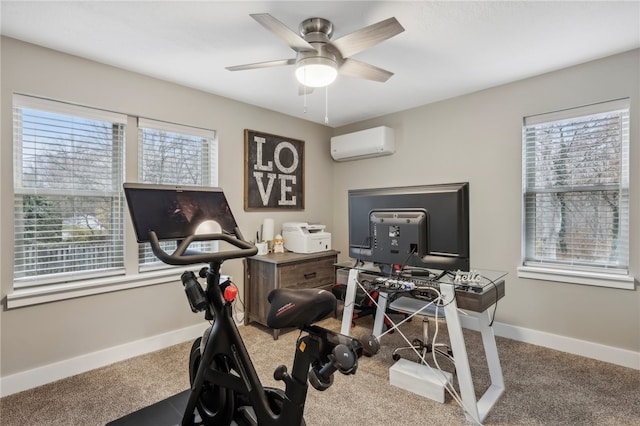 exercise room featuring an AC wall unit, ceiling fan, and carpet