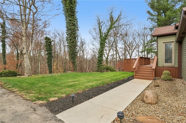 view of yard featuring a deck