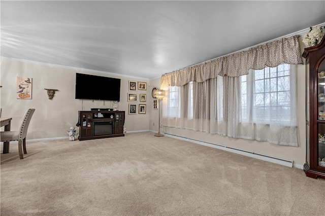 unfurnished living room with crown molding, carpet floors, and a baseboard radiator