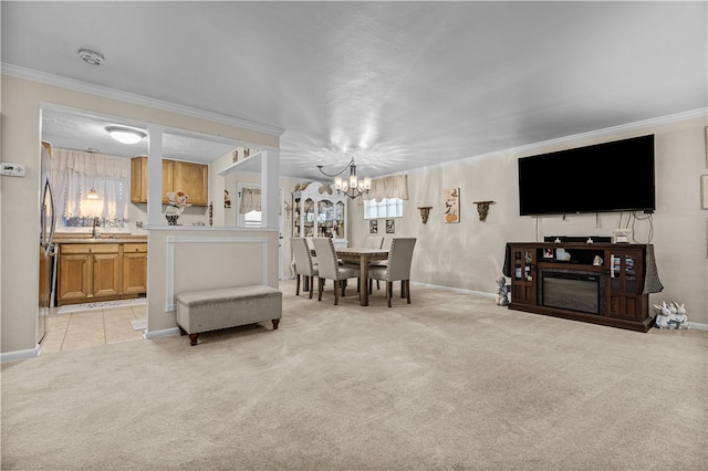 carpeted living room featuring an inviting chandelier, ornamental molding, and sink