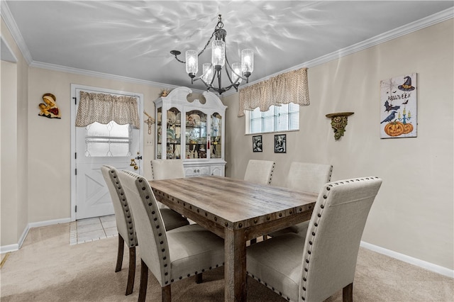 carpeted dining space featuring crown molding and a notable chandelier