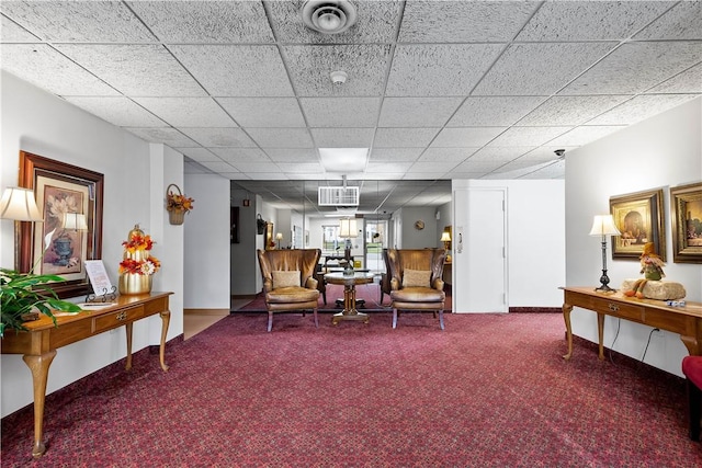 living area featuring carpet floors