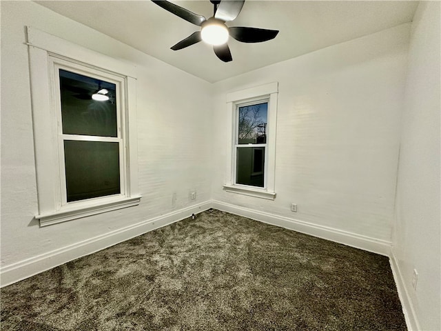 carpeted empty room with ceiling fan