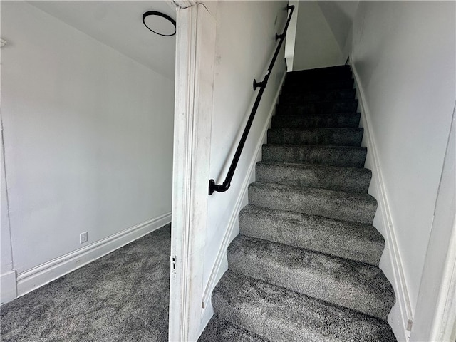 staircase with carpet