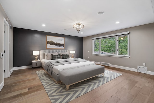 bedroom featuring hardwood / wood-style floors