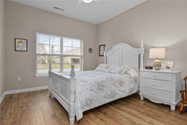 bedroom featuring wood-type flooring and ceiling fan