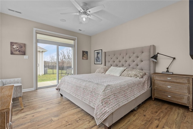 bedroom with access to outside, ceiling fan, and light hardwood / wood-style flooring