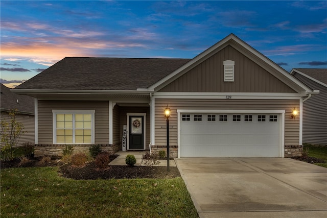 craftsman house featuring a garage