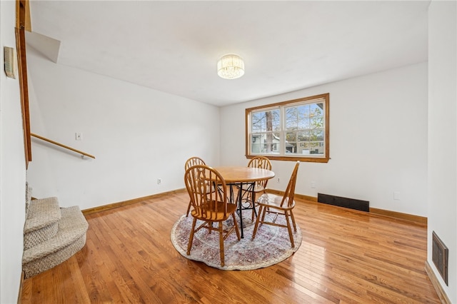 dining room with light wood-type flooring