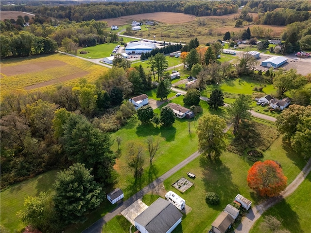 birds eye view of property with a rural view