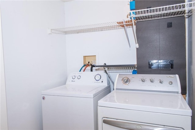 washroom featuring independent washer and dryer