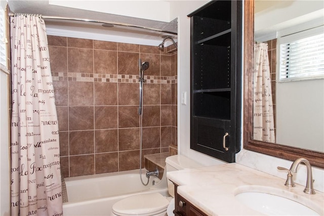 full bathroom featuring vanity, shower / bath combo, and toilet