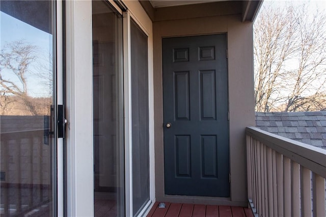 doorway to property with a balcony