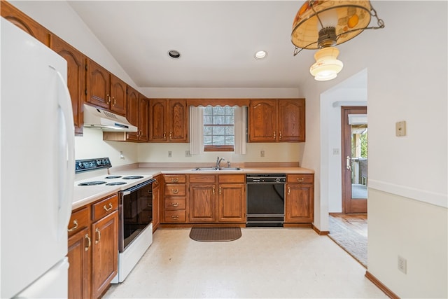 kitchen with lofted ceiling, sink, and white appliances