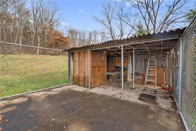 view of outdoor structure with a lawn