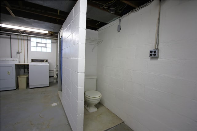 basement with washing machine and clothes dryer