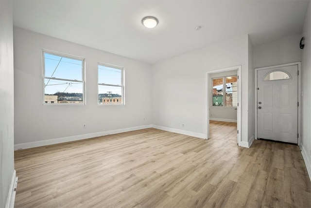 foyer entrance featuring light hardwood / wood-style flooring