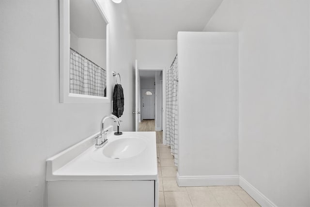 bathroom featuring tile patterned floors and vanity