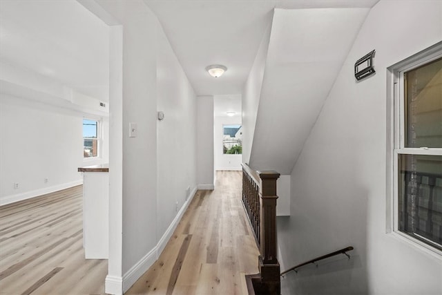 hall with light wood-type flooring