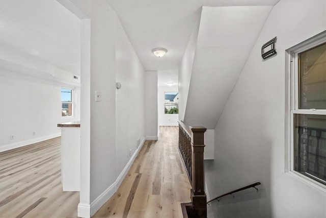 810 Hays St, Homestead, PA 15120 - corridor with light wood-type flooring and an upstairs landing