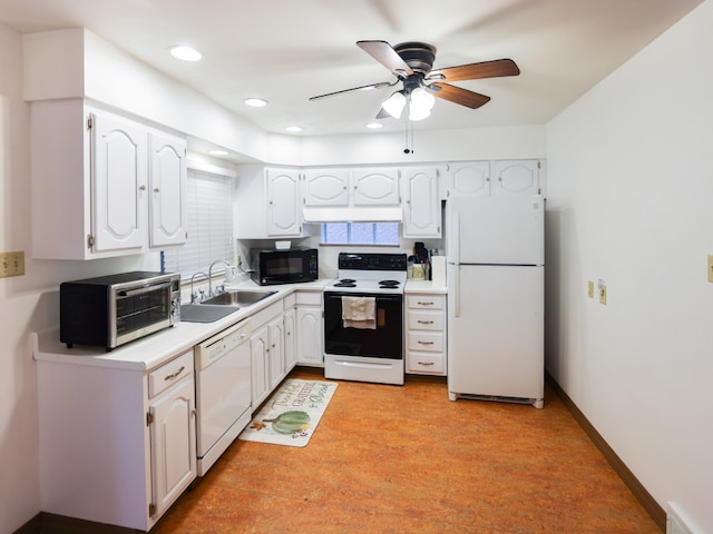 kitchen with light wood-type flooring, white appliances, ceiling fan, sink, and white cabinetry