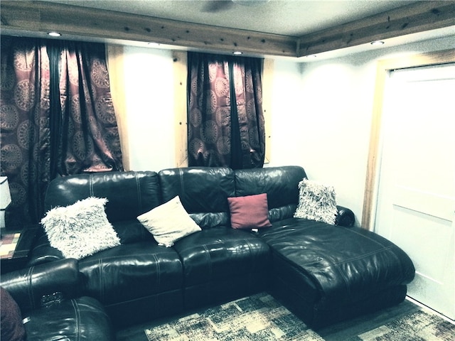 living room featuring a textured ceiling