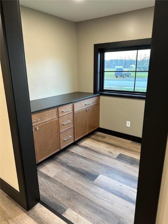 kitchen with light hardwood / wood-style flooring