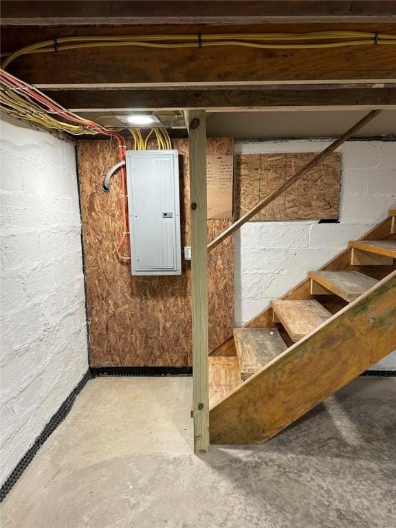 basement featuring electric panel