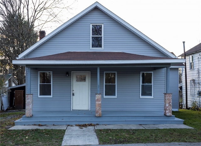 bungalow-style house featuring covered porch