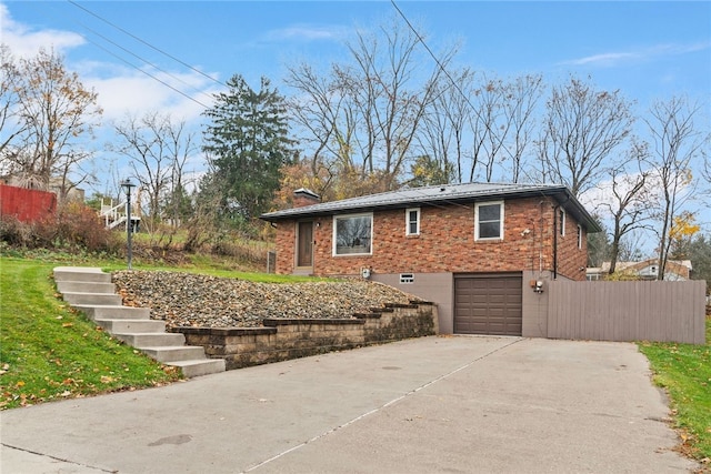 view of home's exterior with a garage