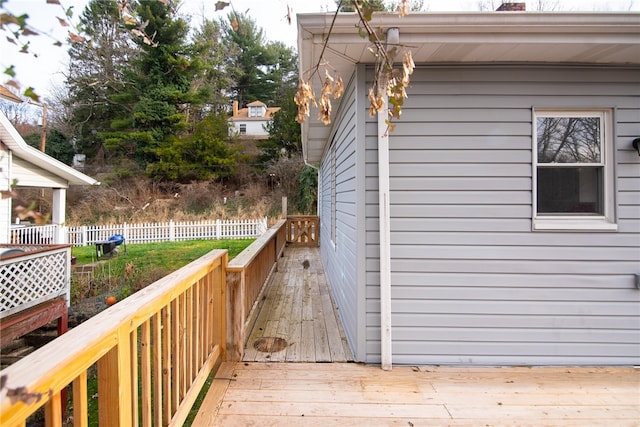 view of home's exterior with a wooden deck