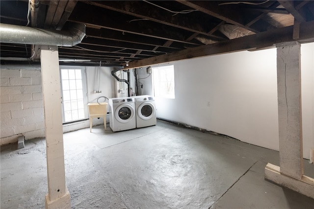 basement with plenty of natural light and washer and dryer