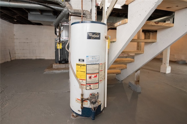 utility room with water heater