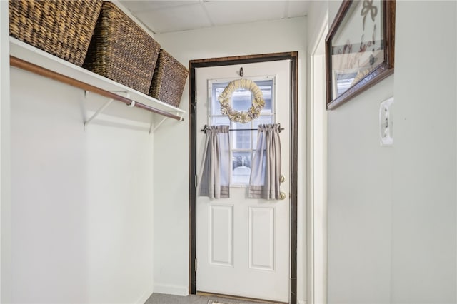 doorway to outside with carpet